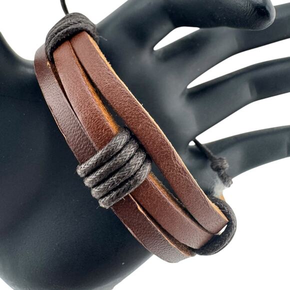 Feral Braided Leather Cuff: Adjustable Anarchy for Any Wrist - Picture 1 of 3